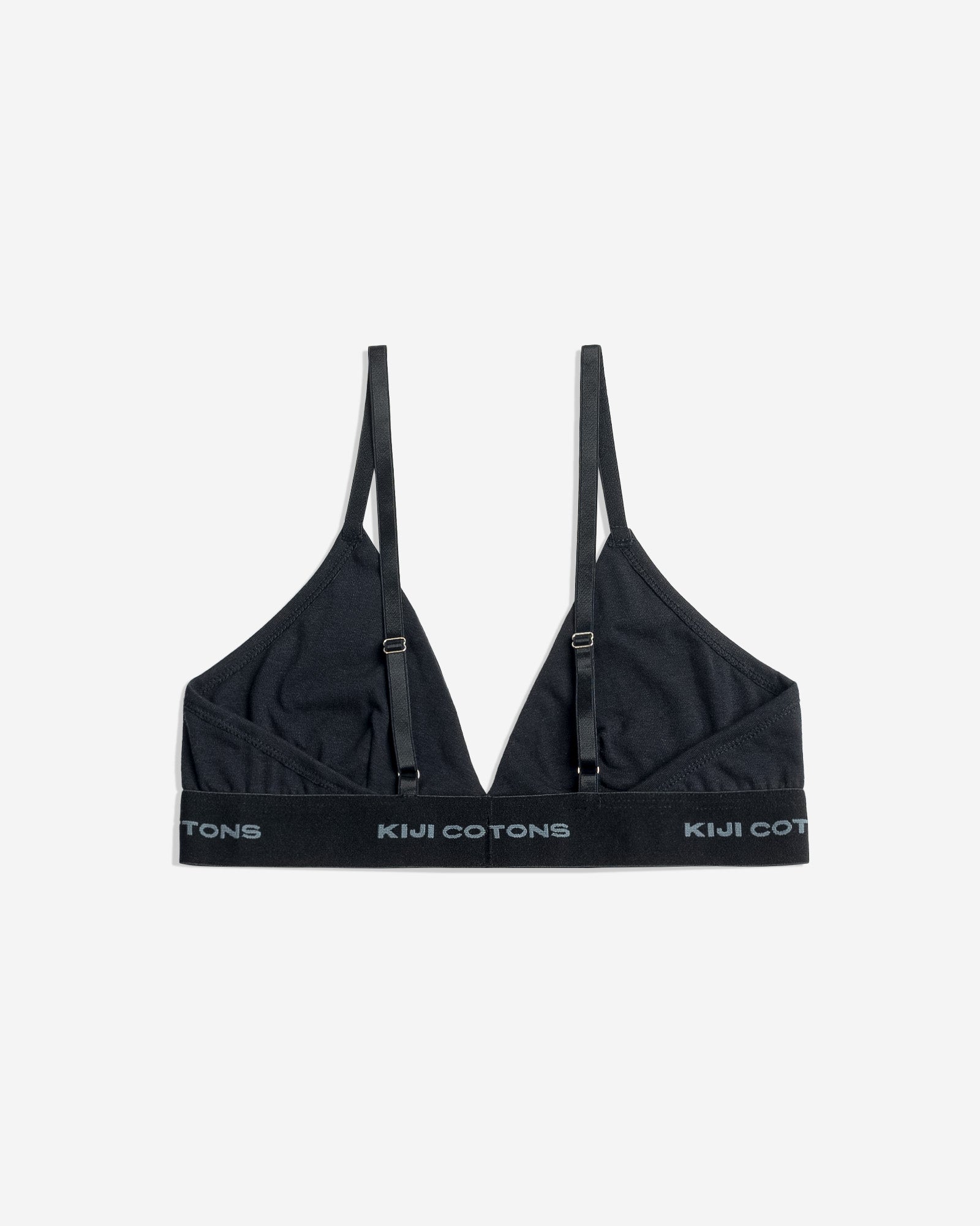 Uma unidade do Top V Kiji 100% algodão na cor preta vista de costas. O top possui regulador de altura para as alças.